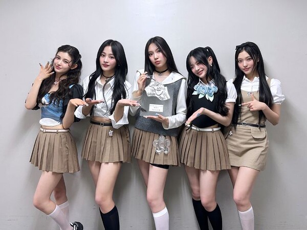 Members of the K-pop girl group NewJeans pose to promote their songs. Photo courtesy of Ador